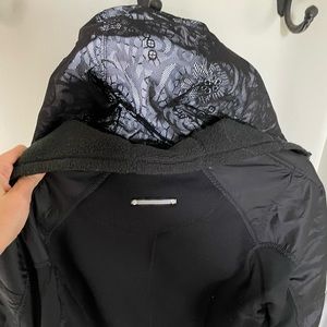 Lululemon running jacket with detachable hood.